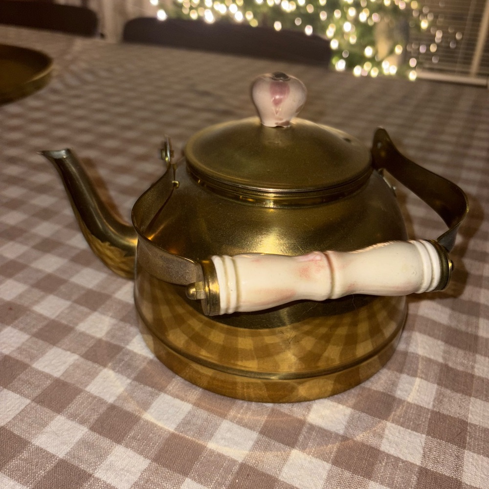 Elegant Gold Teapot with White Handle
